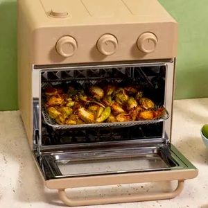 Our place mini oven- air fryer and much more.  Roasts. Bakes. Toasts. Broils